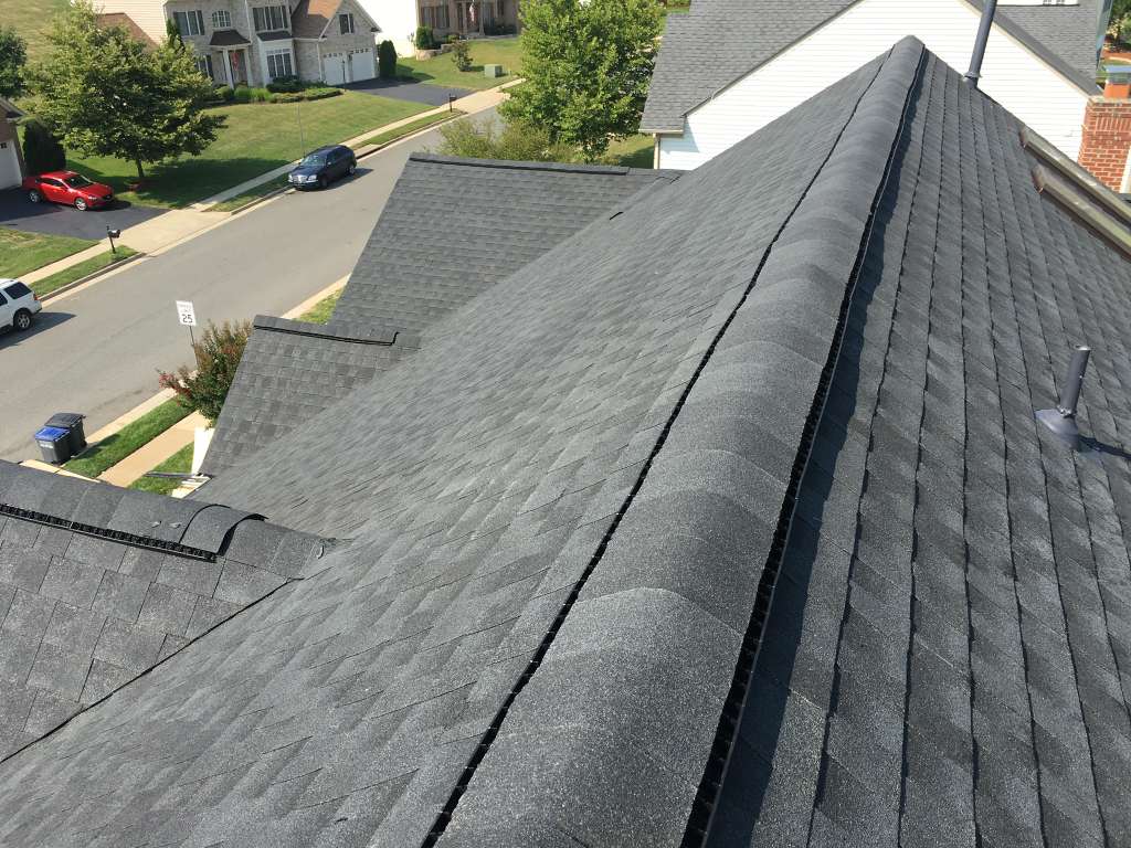 Completed dark shingle roof Houston TX