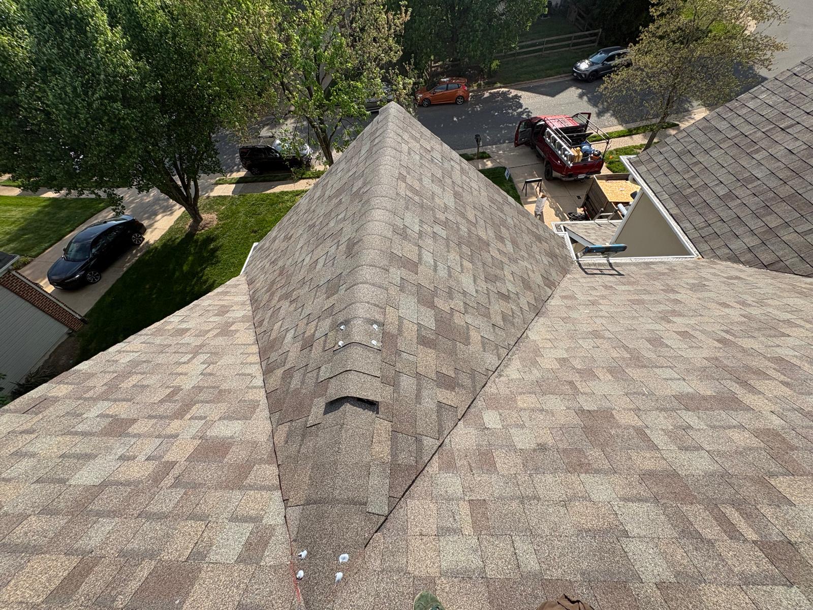 Completed shingle roof valley Houston