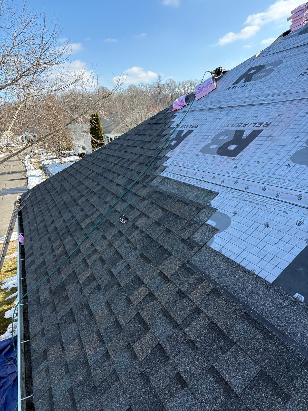 Roof shingle layering process Houston